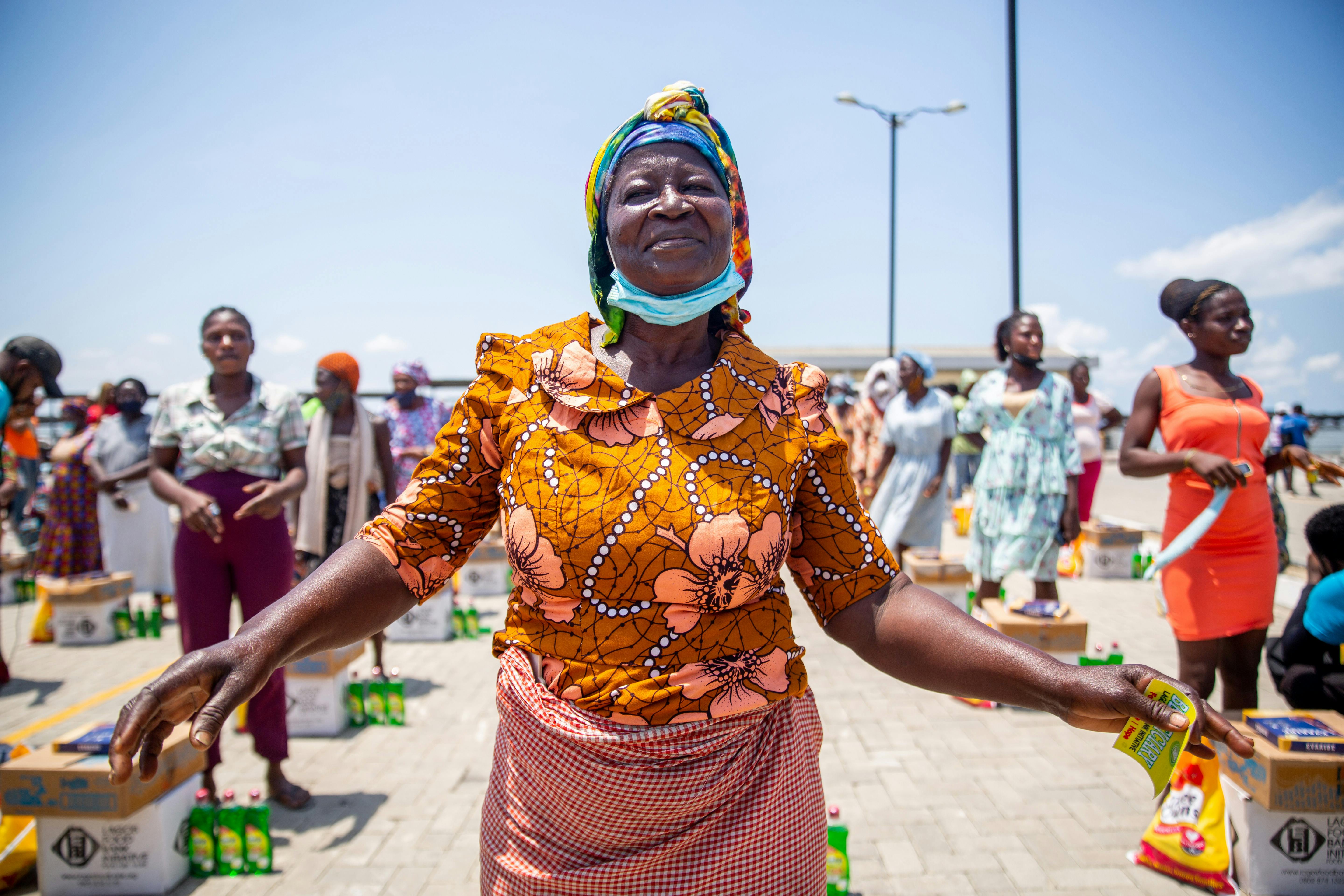 A vibrant image of a rural Kenyan market or community.